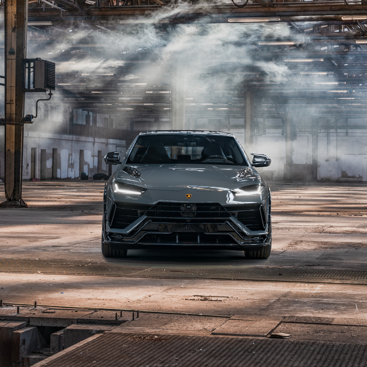 Front view of blue Urus in warehouse