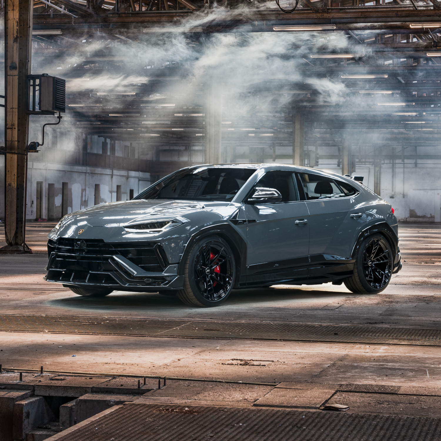 Blue Urus in warehouse from the side front view